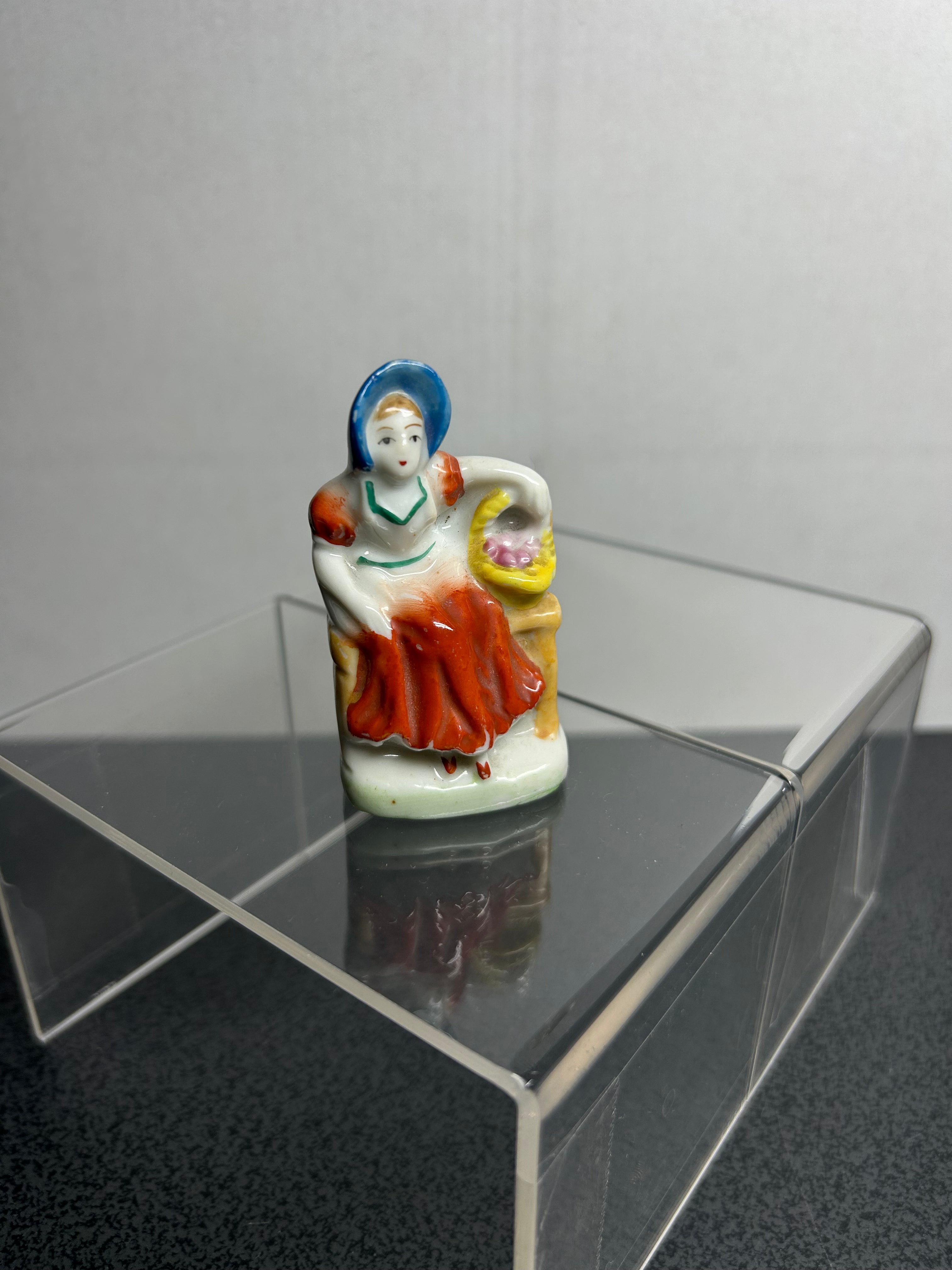 "Occupied Japan" Lady Sitting with Basket Figure