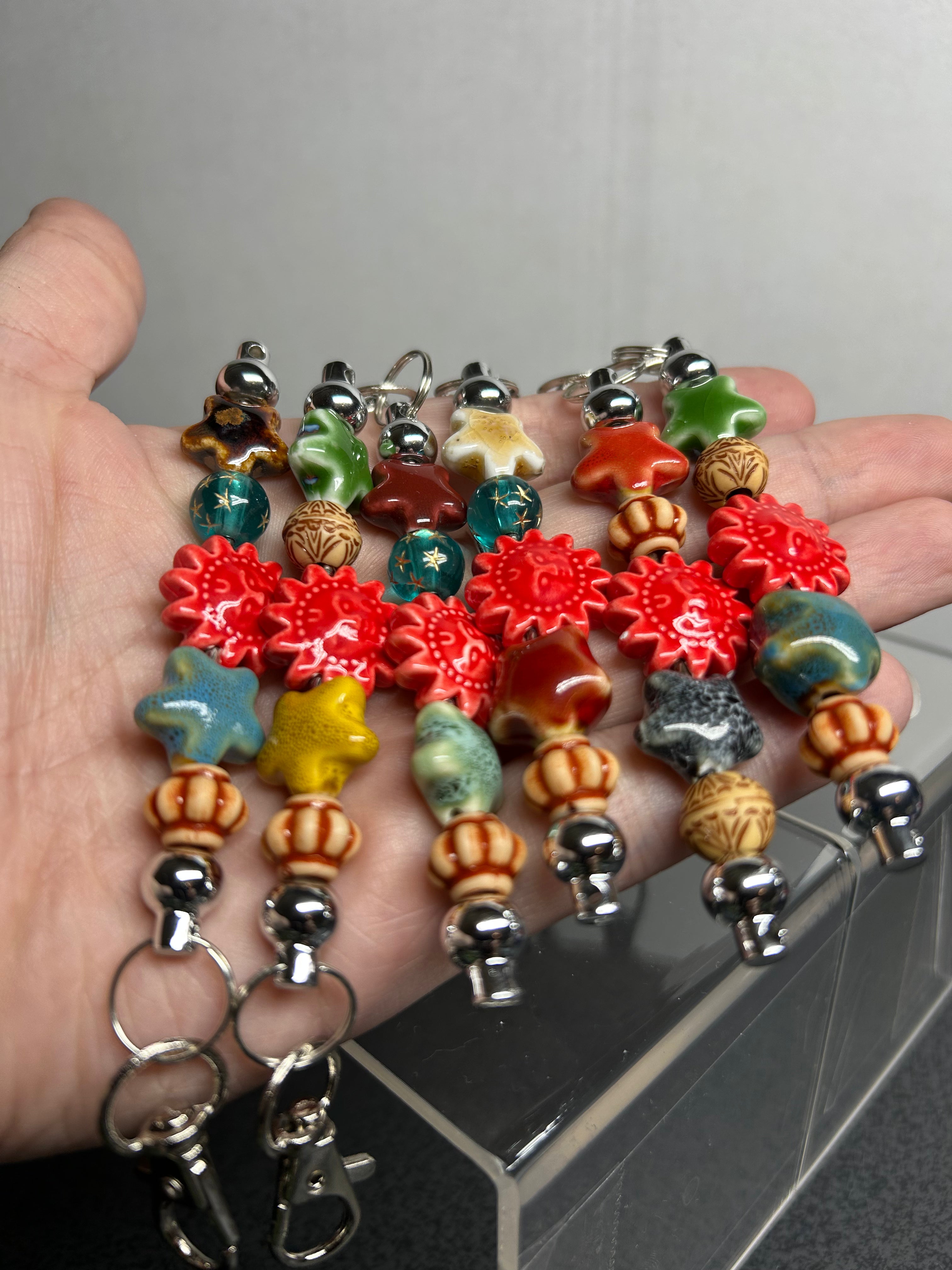 Red Ceramic Sun Keychains